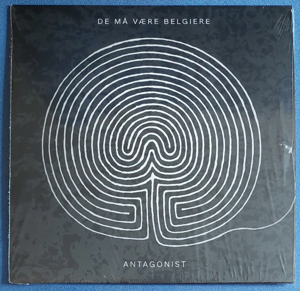 De Må Være Belgiere – Antagonist